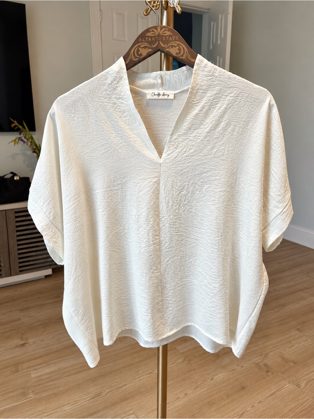 Cropped V-Neck Textured Blouse in White by Charlotte Avery